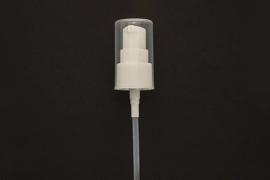 Plastic cream dispenser pump with transparent overcap and PP20 finish. Plastic cream dispenser pump with transparent overcap and PP20 finish.