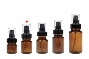 Bouteille cylindrique en plastique de 60 ml avec pompe à crème noire et bouchon transparent-photo_groupe