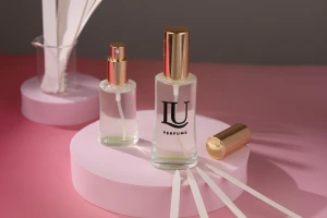 Oval glass bottle 50ml (18/415) with gold shiny spray for perfumes - (minimum order: 1 carton)-image_group