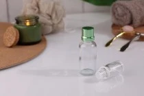 Γυάλινο μπουκαλάκι για αιθέρια έλαια 30 ml διάφανο με στόμιο PP18