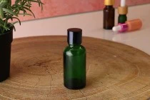 Γυάλινο μπουκαλάκι για αιθέρια έλαια 30 ml πράσινο με στόμιο PP18