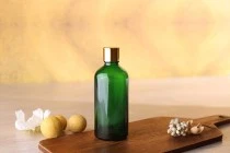Γυάλινο μπουκαλάκι για αιθέρια έλαια 100 ml πράσινο με στόμιο PP18