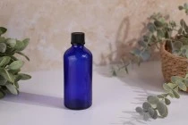 Γυάλινο μπουκαλάκι για αιθέρια έλαια 100 ml μπλε με στόμιο PP18