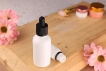 Γυάλινο μπουκαλάκι για αιθέρια έλαια 50 ml λευκό με στόμιο PP18