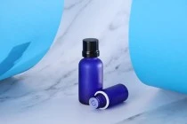 30ml blue frosted glass bottle with PP18 finish for essential oils