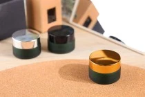Green frosted 20ml glass jar with sealing disc and EPE liner inserted in the cap
