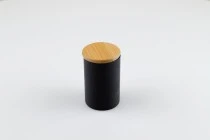 Glass jar with rubber sealed wooden lid in different matte colors, in size 65x100 mm