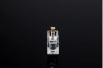 Glass perfume bottle with gold spray, elegant acrylic, red cap and special case with magnetic closure. Capacity 30ml. (minimum order: 1 box)
