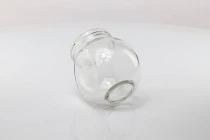 600ml tilted glass jar with a transparent silver plastic cap. The jar stands upright or tilted 600ml tilted glass jar with a transparent silver plastic cap. The jar stands upright or tilted