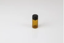 Flaconcino di vetro in colore ambra da 5 ml con tappo di sicurezza nero in plastica (a pressione) per farmaci e omeopatici. Flaconcino di vetro in colore ambra da 5 ml con tappo di sicurezza nero in plastica (a pressione) per farmaci e omeopatici.