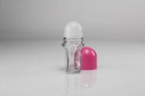 Flacon roll-on en verre de 50 ml avec bouchon en plastique rose Flacon roll-on en verre de 50 ml avec bouchon en plastique rose
