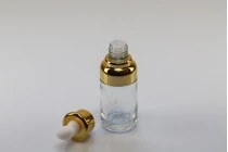 Μπουκαλάκι 50 ml γυάλινο με σταγονόμετρο, αποστραγγιστήρα και καπάκι Μπουκαλάκι 50 ml γυάλινο με σταγονόμετρο, αποστραγγιστήρα και καπάκι