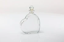 Μπομπονιέρα μπουκαλάκι 200 ml για γάμο σε σχήμα καρδιάς Μπομπονιέρα μπουκαλάκι 200 ml για γάμο σε σχήμα καρδιάς